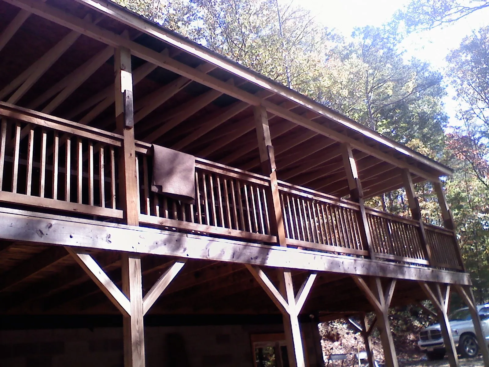 Timber framing under a new elevated porch and deck — Roof Leak Repair in Bridgton by Roofing Brothers